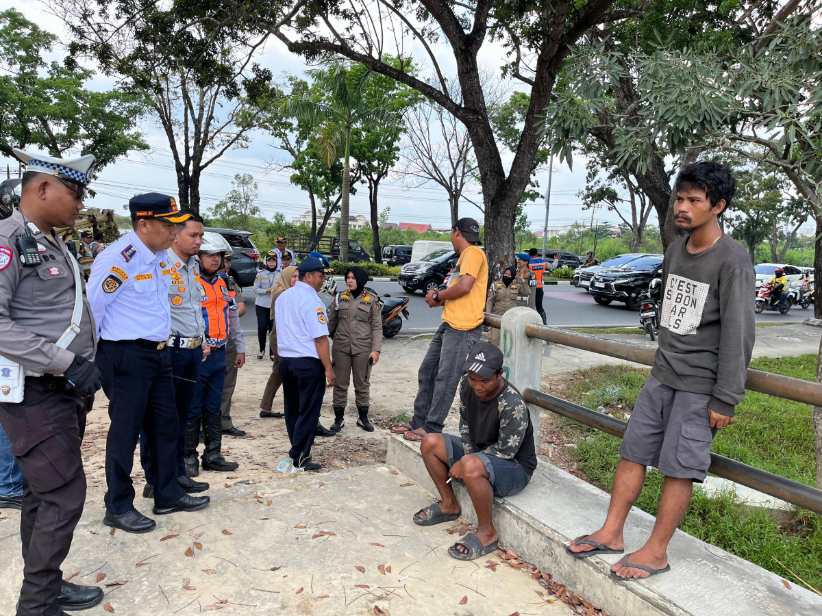 Dishub Pekanbaru Bersama Aparat Gabungan Kembali Amankan Pak Ogah
