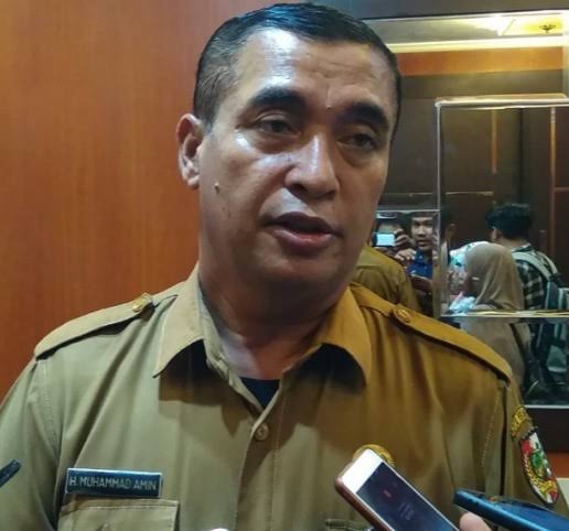 Kepala Dinas Pengendalian Penduduk dan KB Kota Pekanbaru, Muhammad Amin